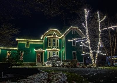 Green house in historic Saratoga decorated professionally for Christmas