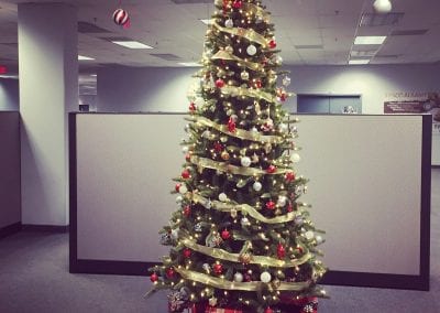 Interior Christmas tree decorating for a corporate office in CLifton Park NY