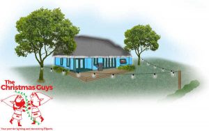 patio string lights hung in a v pattern in a backyard