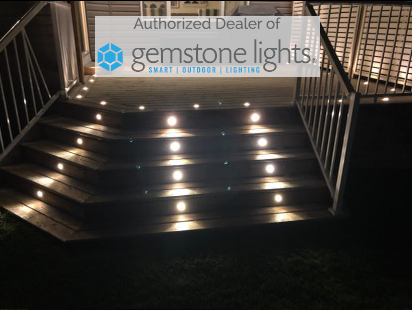 deck riser lights low voltage installed on a deck